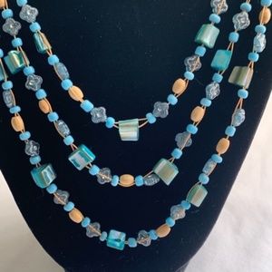 Teal/turquoise and tan bead & string necklace